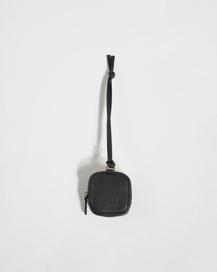a black purse with a strap