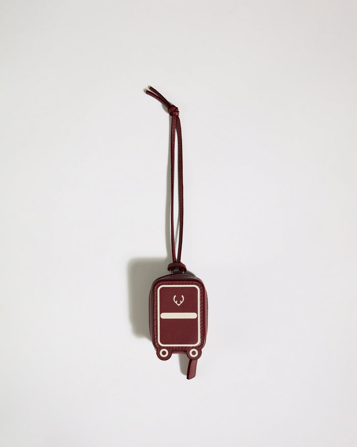 a red luggage tag on a string