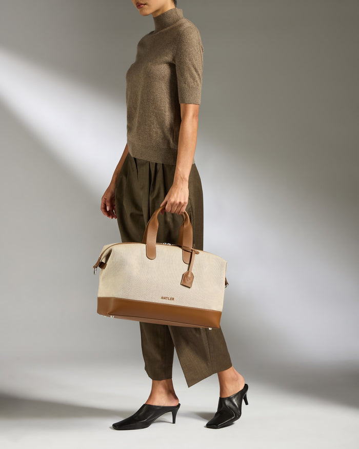 a woman holding a bag