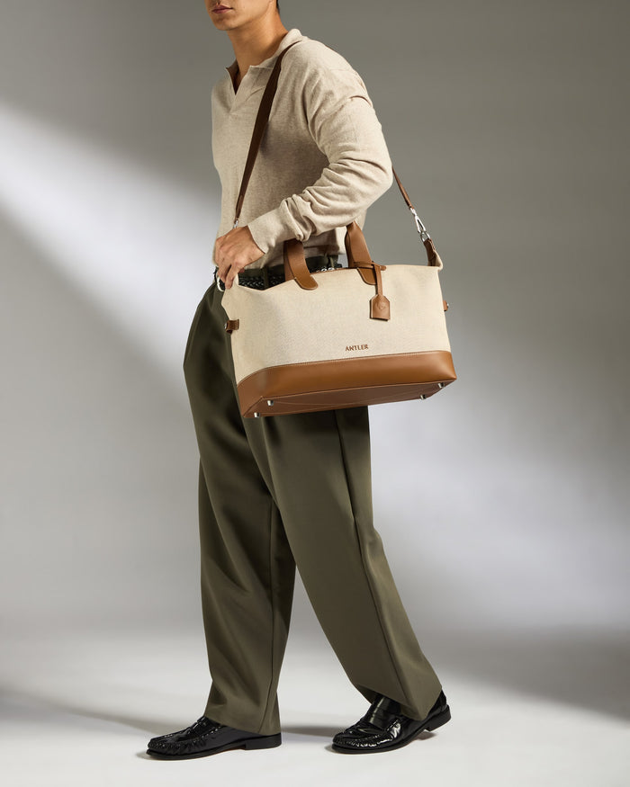 a woman carrying a bag