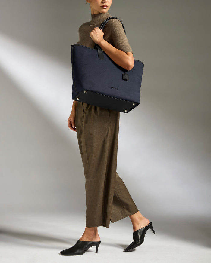 a woman holding a bag