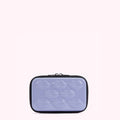 Lavender purple rectangular cosmetic bag with black zipper and lip-shaped embossing.