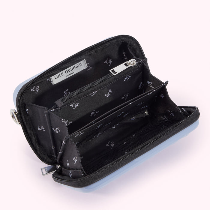 Open light blue Lulu Guinness London zip-around wallet showing multiple card slots and compartments.