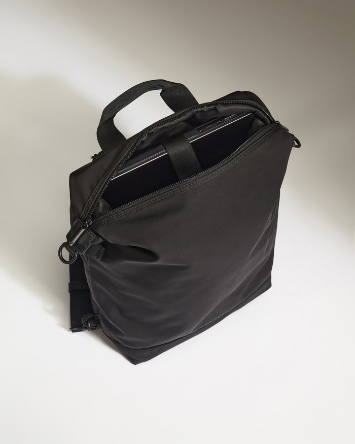 a black bag with a laptop inside
