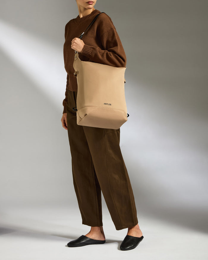 a woman holding a bag