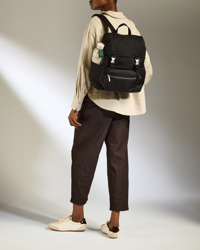 a woman wearing a backpack
