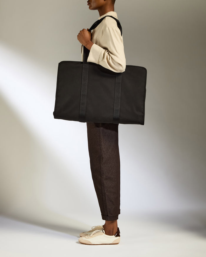 a woman holding a bag