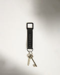 a key chain with keys on it
