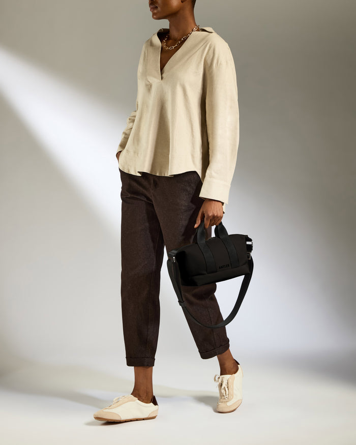a woman holding a bag
