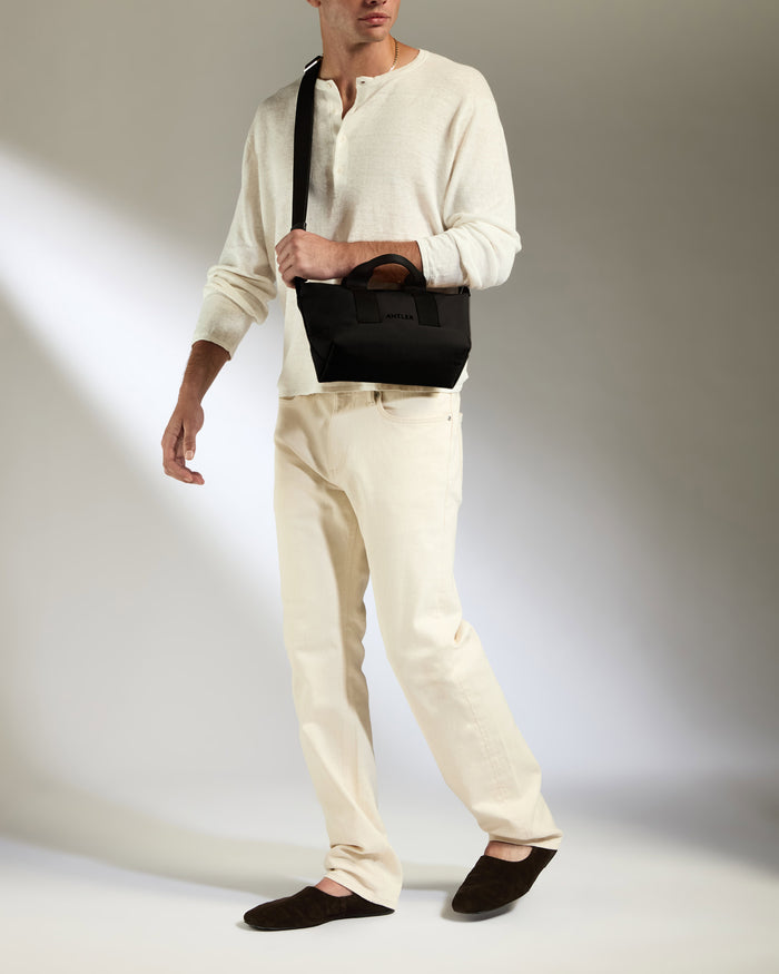 a man in white clothes