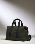 a green bag with a strap
