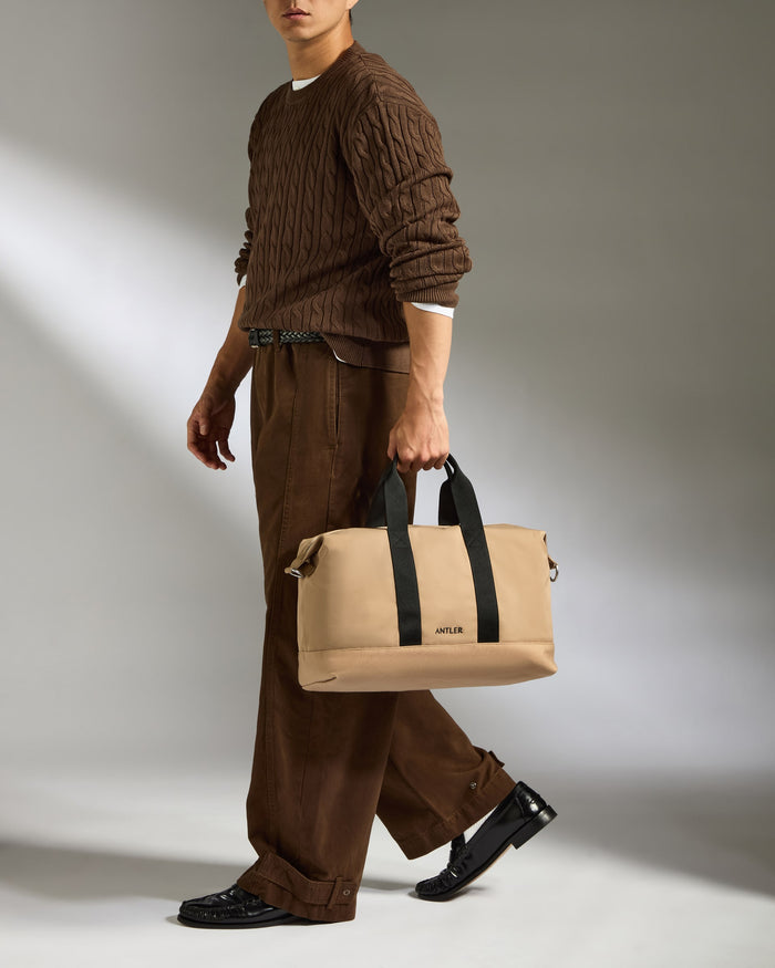 a man walking with a bag