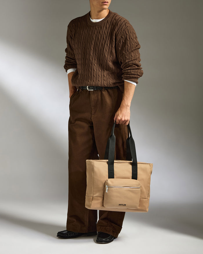 a man holding a bag