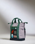 a grey and green bag with a green strap