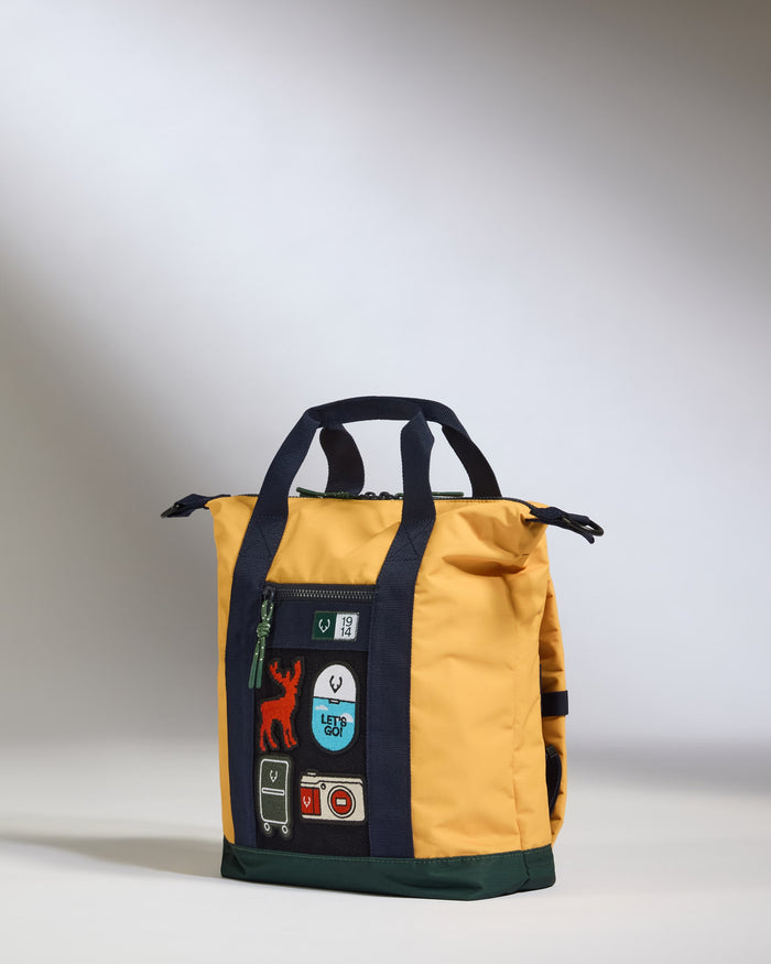 a yellow bag with a patchwork design