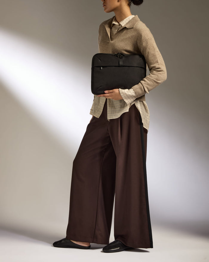 a woman holding a bag