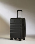 a black suitcase with wheels