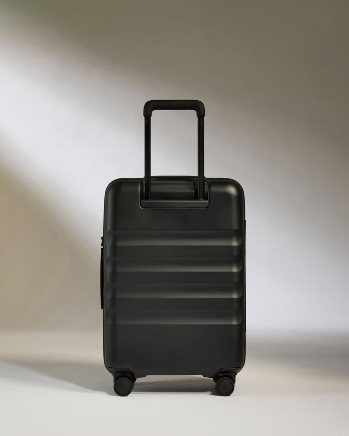 a black suitcase with wheels