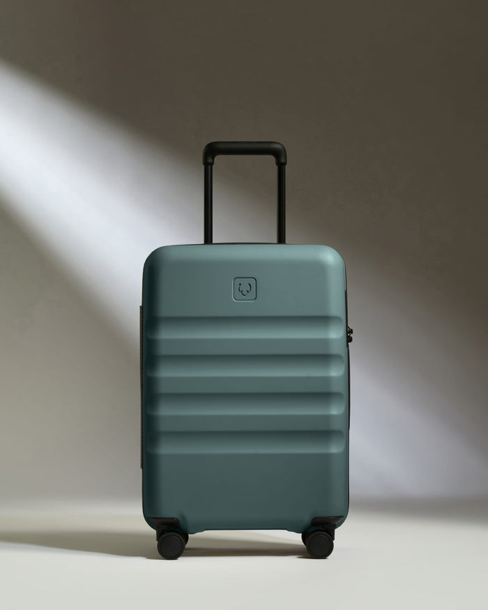 a blue suitcase with wheels