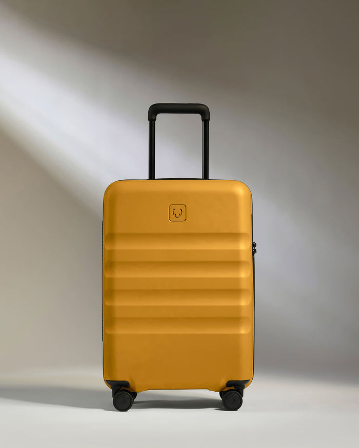 a yellow suitcase with wheels