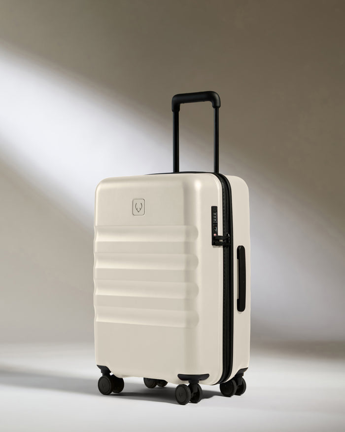 a white suitcase with wheels