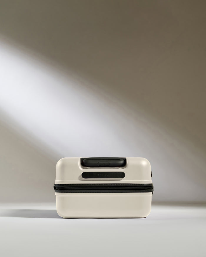 a white and black suitcase