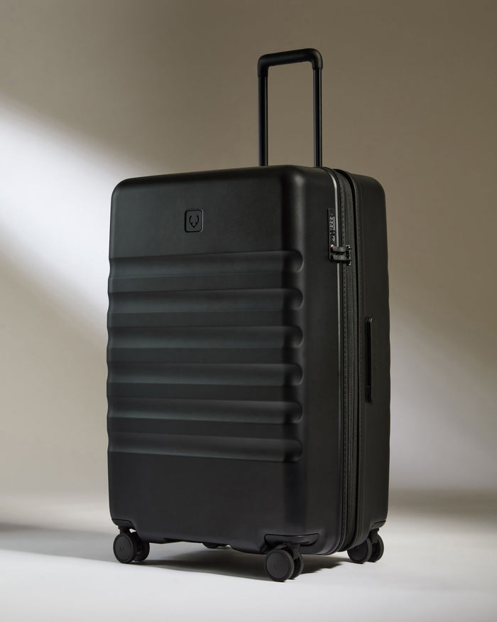 a black suitcase with wheels