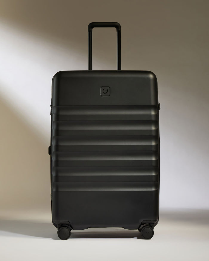 a black suitcase with wheels