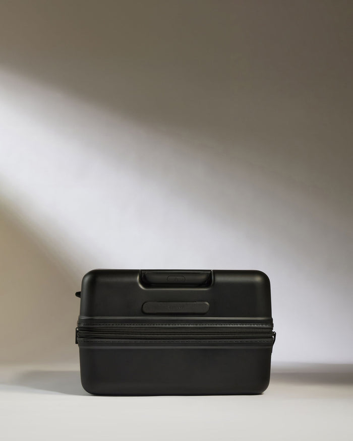 a black suitcase with zipper