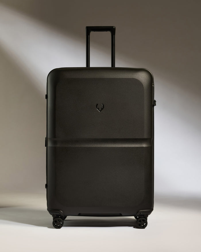 a black suitcase with wheels