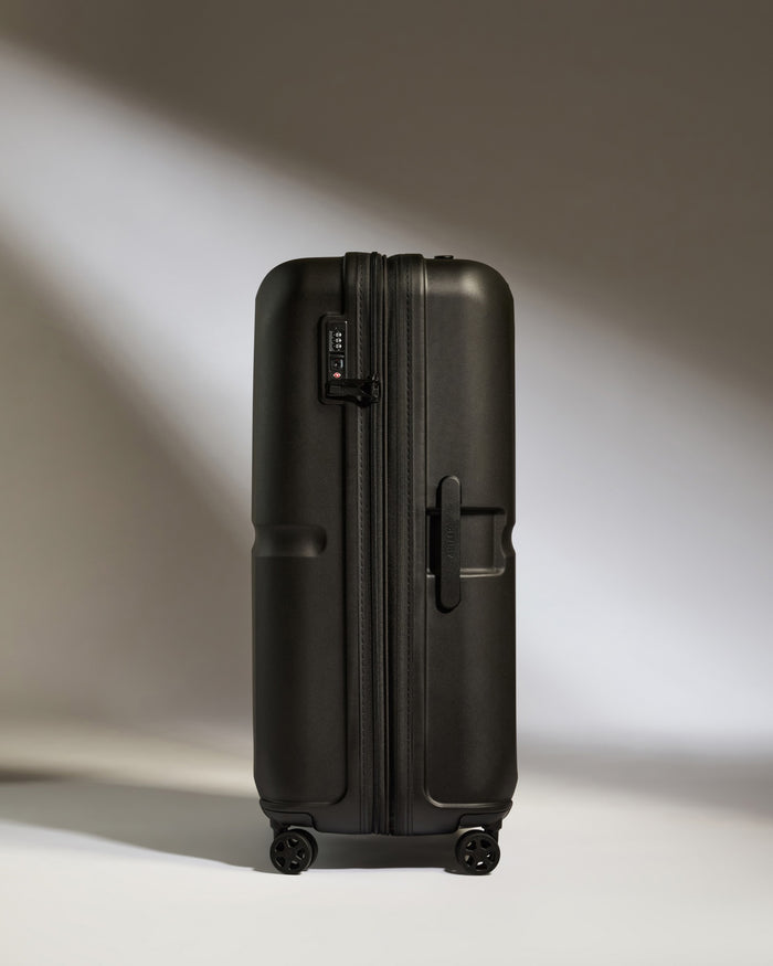 a black suitcase with wheels