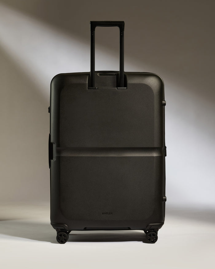 a black suitcase with wheels