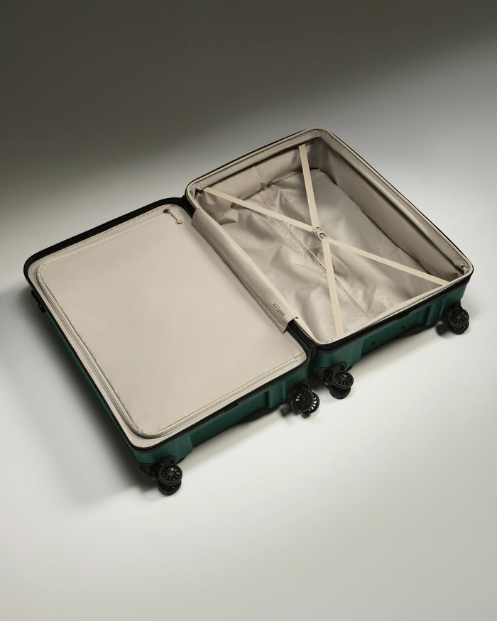 a suitcase with wheels and a lid