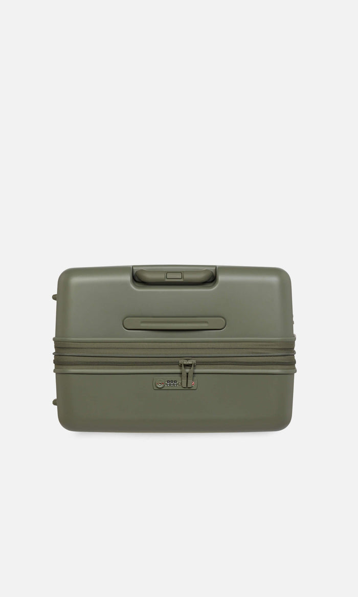 a green suitcase with zippers