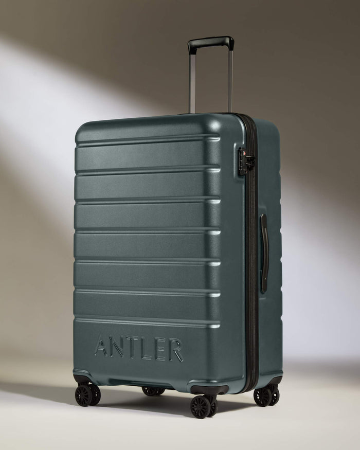 a suitcase with wheels and handle