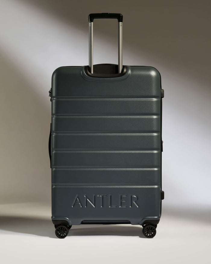 a suitcase with handle on wheels