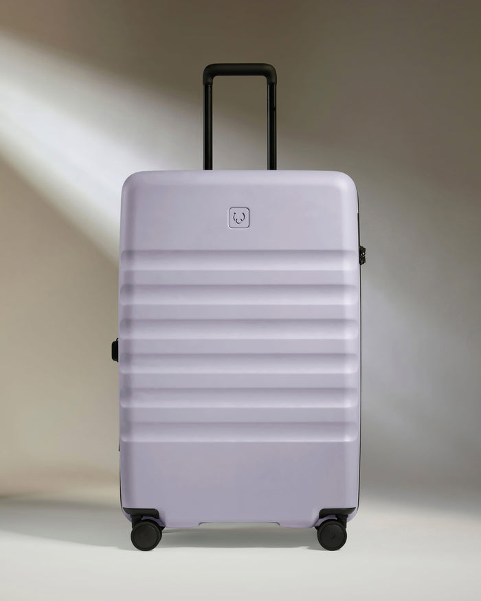 a suitcase with wheels and handle