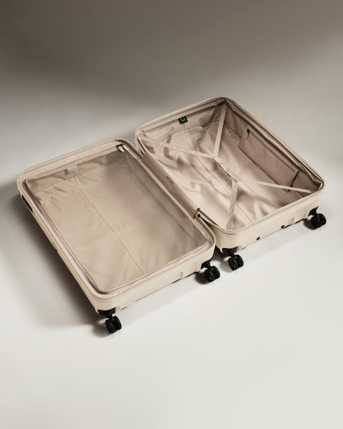 a suitcase with wheels and a lid