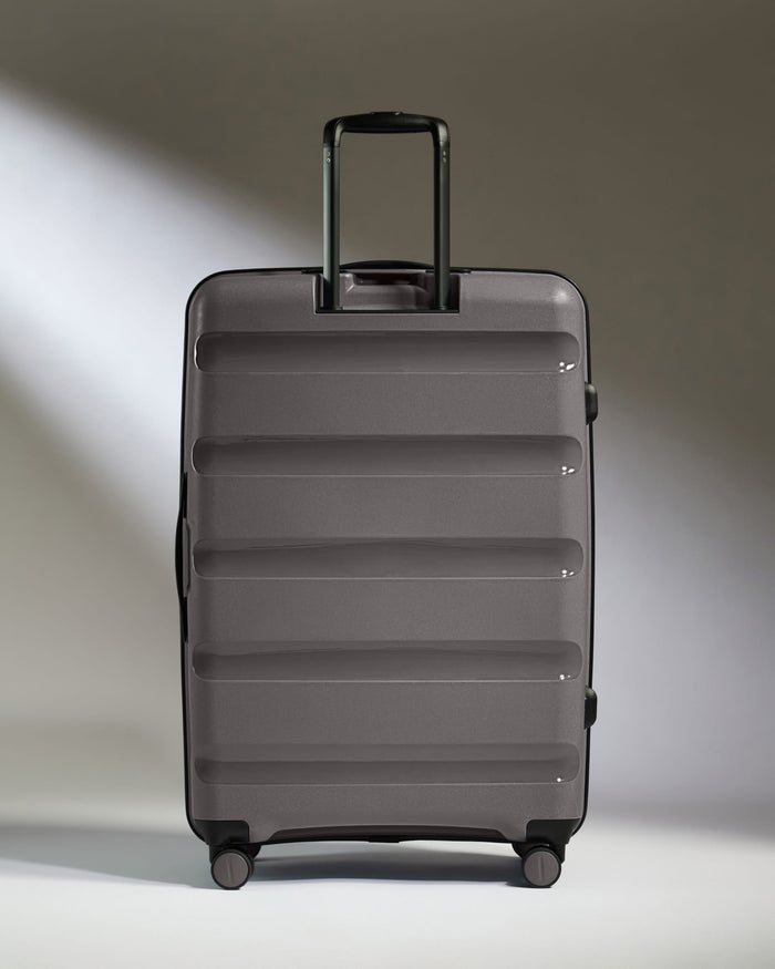 Antler Luggage -  Expandable Large Suitcase in Gloss Gull Grey - Logo Stripe - Expanding Rollercase | Large 4W Expandable Large Suitcase in Gloss Gull Grey - Logo Stripe