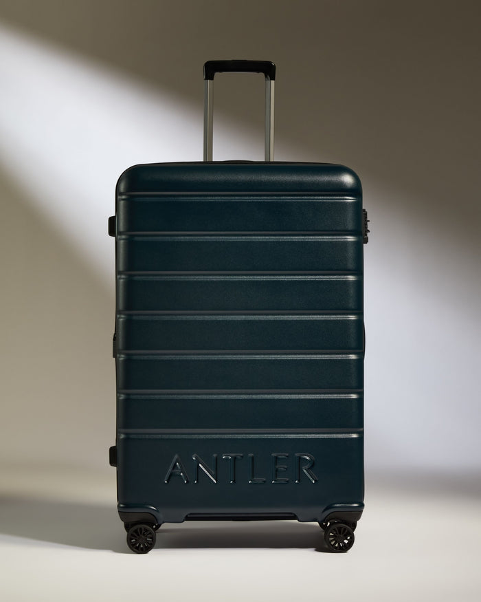 a suitcase with wheels and handle