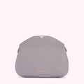 A grey Lulu Guinness purse with a heart-shaped top detail against a white background.