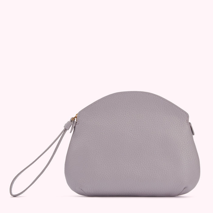 A light grey leather clutch with a wrist strap.