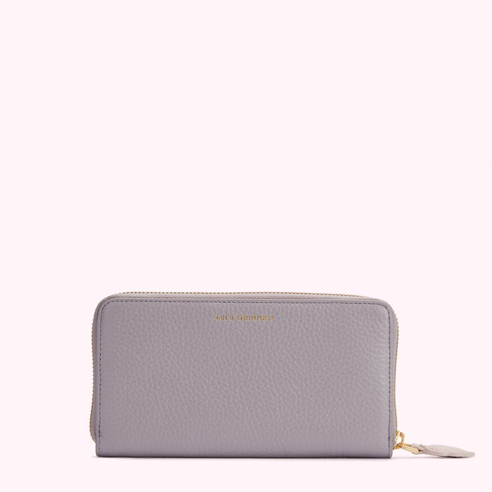 Lilac Lulu Guinness zip-around wallet.