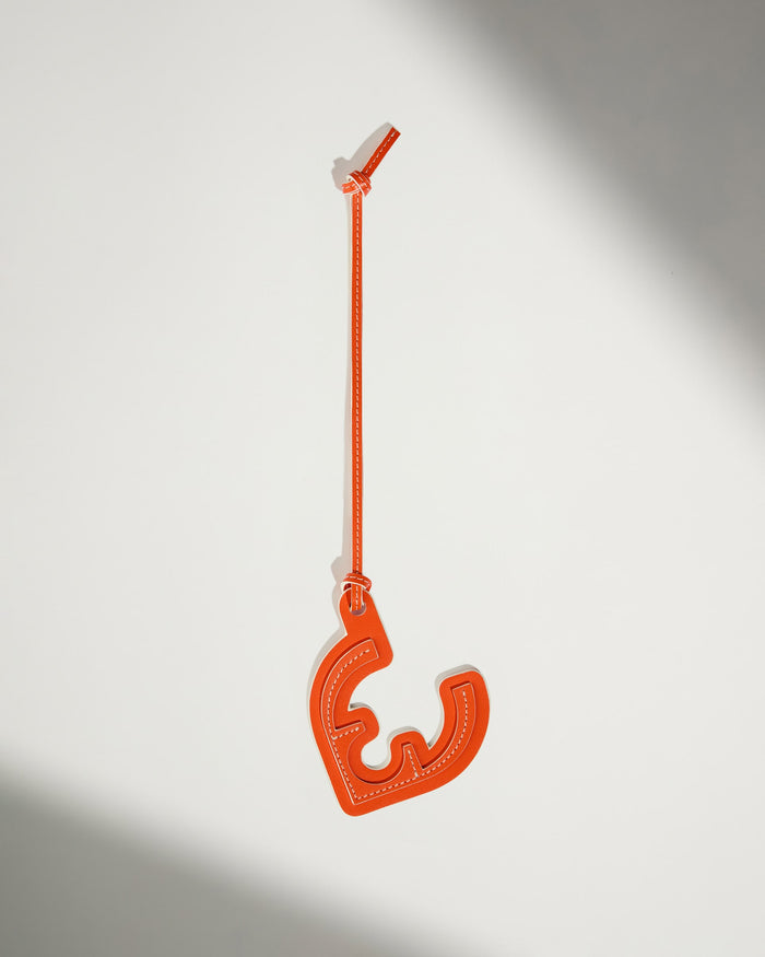 a red object with a string