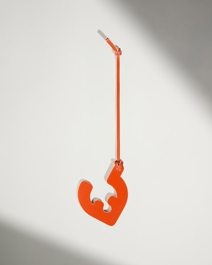 a red tag on a string