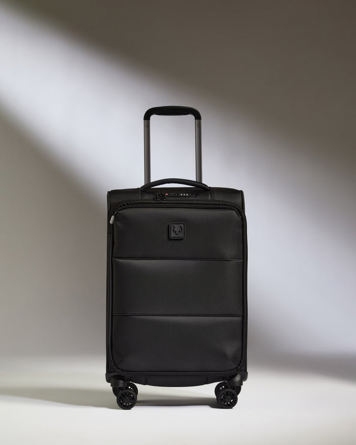 a black suitcase with wheels
