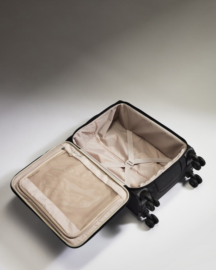 a black suitcase with wheels