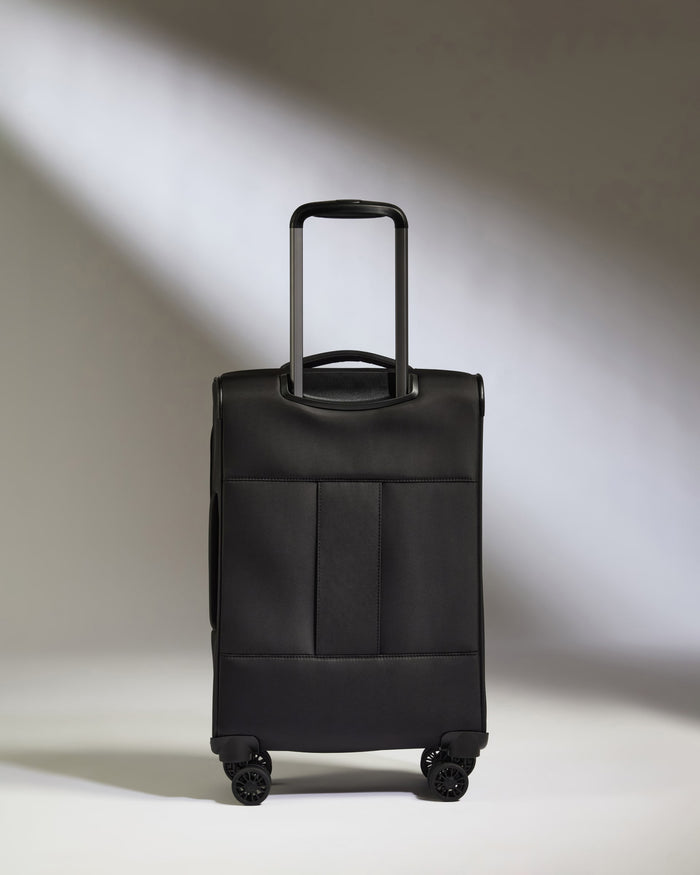 a black suitcase with wheels
