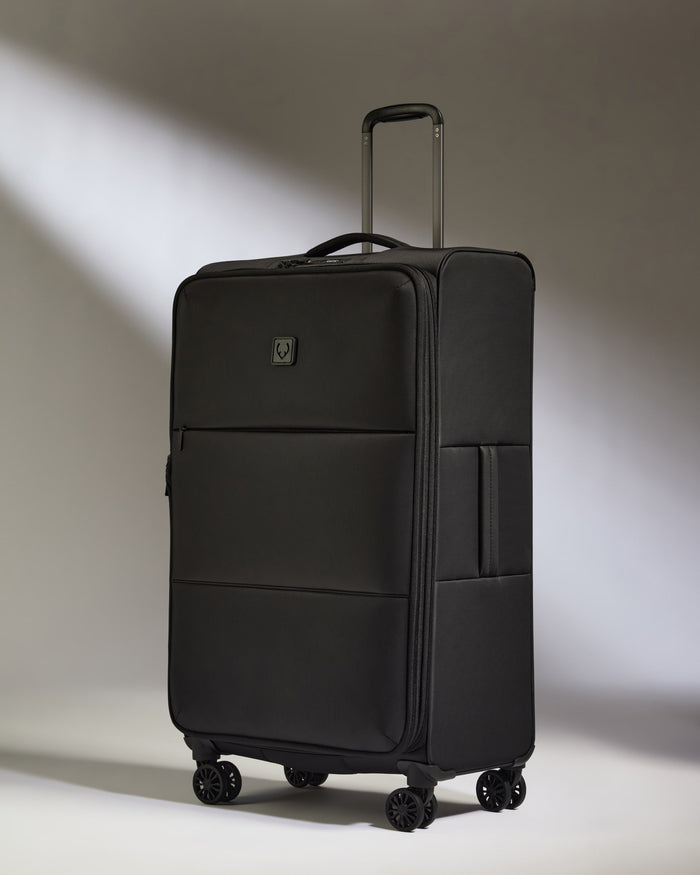 a black suitcase with wheels