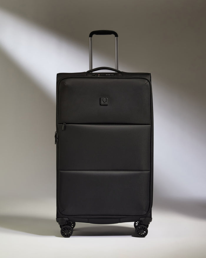 a black suitcase with wheels